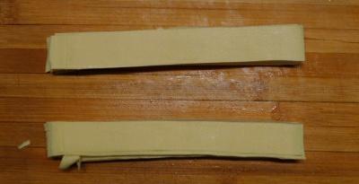 Cut the dried tofu sheet into fine strips fir