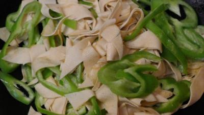Add the green chilies, toss, and season with