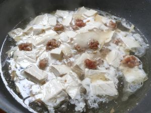 Drop in the pork meatballs