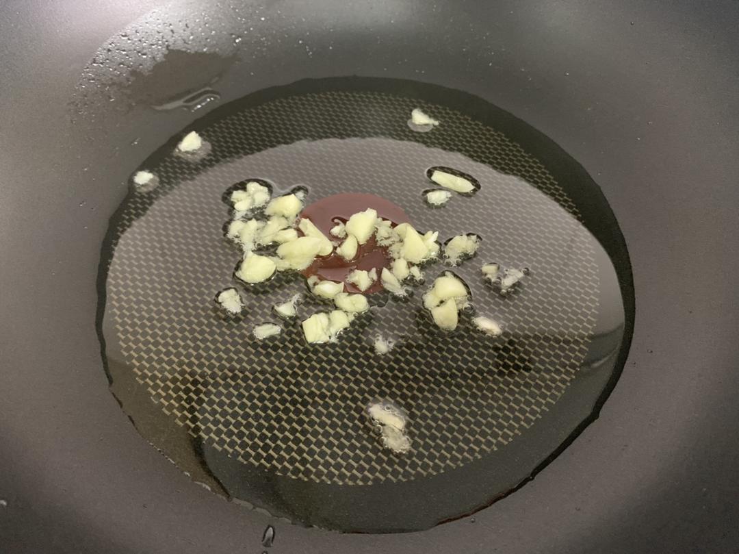 Heat oil and bloom the garlic until fragrant
