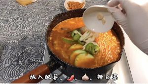 Once the paste melts, add a whole box of silk