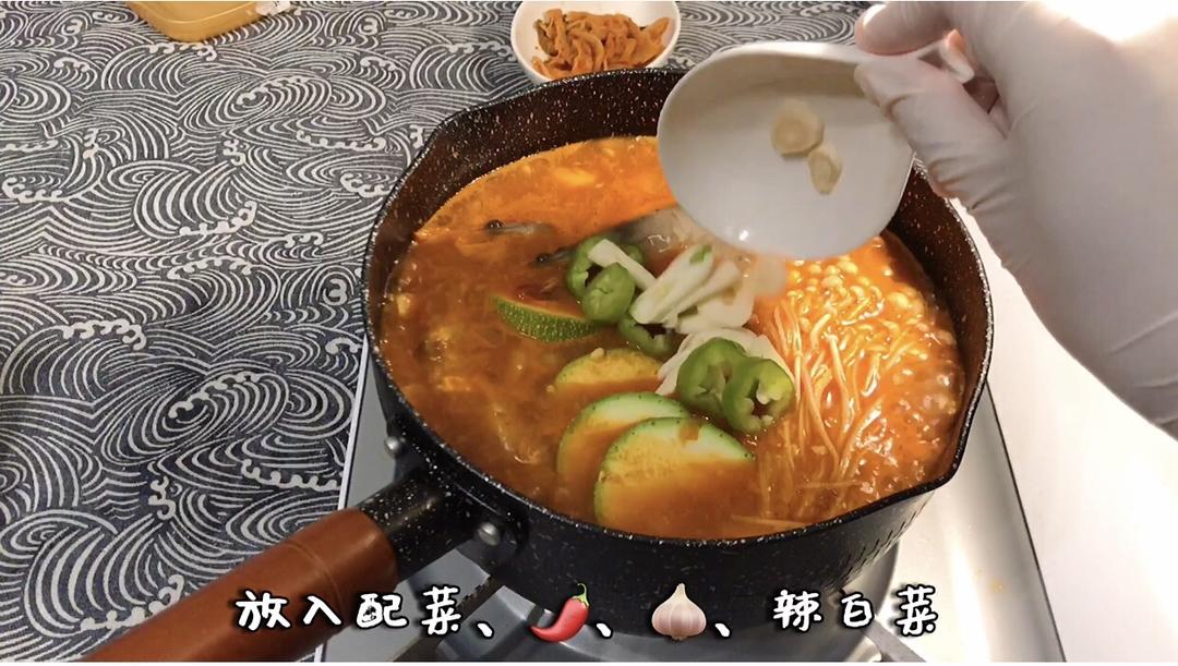 Once the paste melts, add a whole box of silk