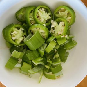 Cut the green chili into segments