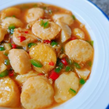 Pan-golden egg tofu in an oyster-soy glaze with chili