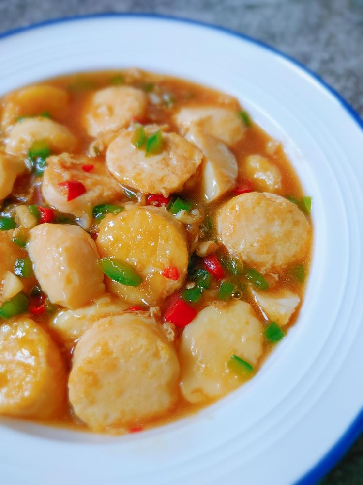 Pan-golden egg tofu in an oyster-soy glaze with chili