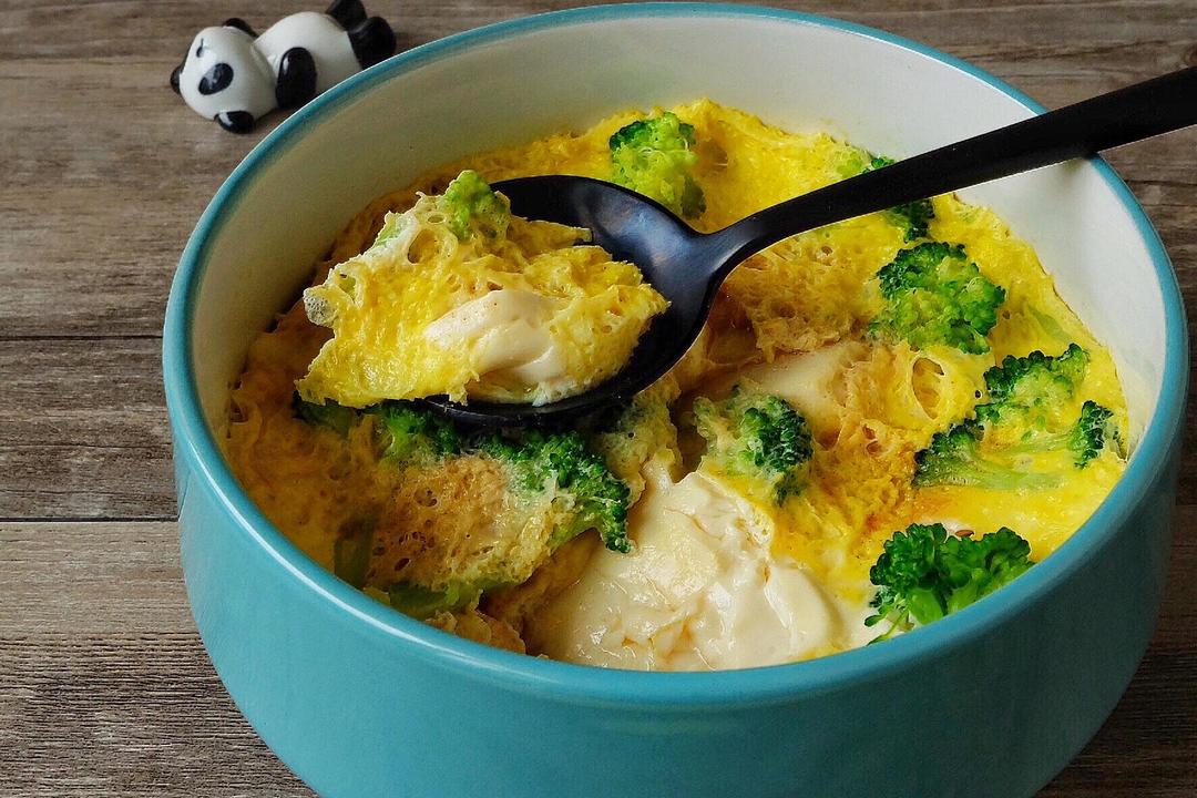Silken tofu under set egg with soy and broccoli in a bowl