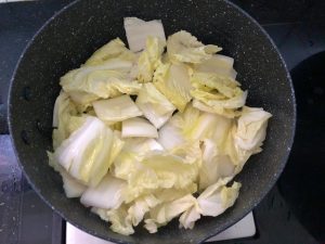 Add the cabbage and toss evenly