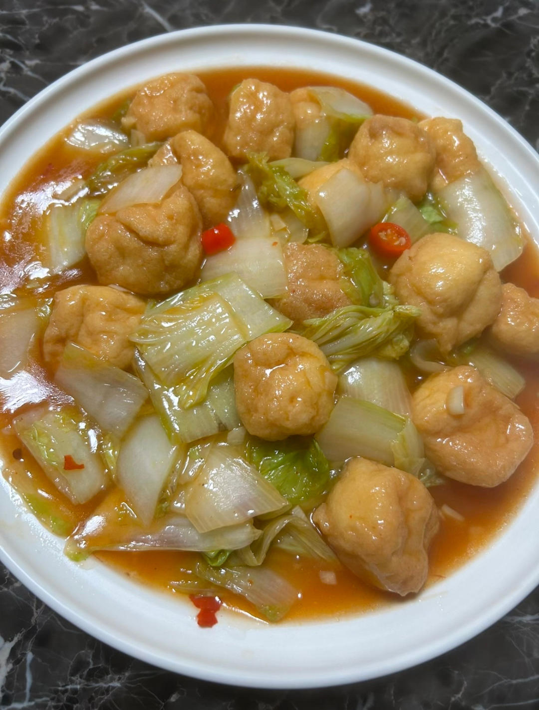 Napa cabbage braised with fried tofu pouches