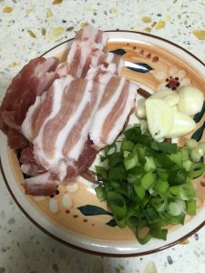 Slice the pork belly
