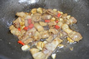 Add the garlic and chili, then a quarter-spoo