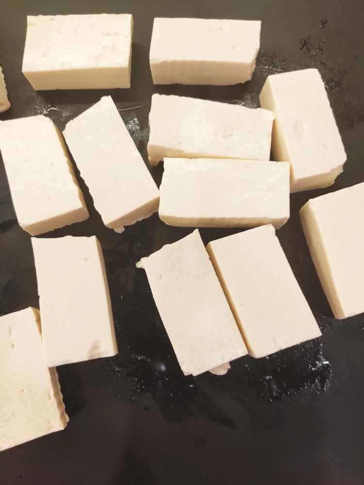 Cut the tofu into pieces - not too thin - and
