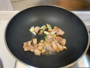 Add a little oil, then the pork belly, and re