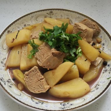 Chewy frozen tofu and potato glazed with cilantro