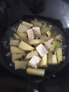 Add water - just below the bottom layer of po