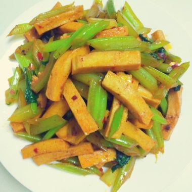 Qianye tofu tossed with celery in doubanjiang red oil