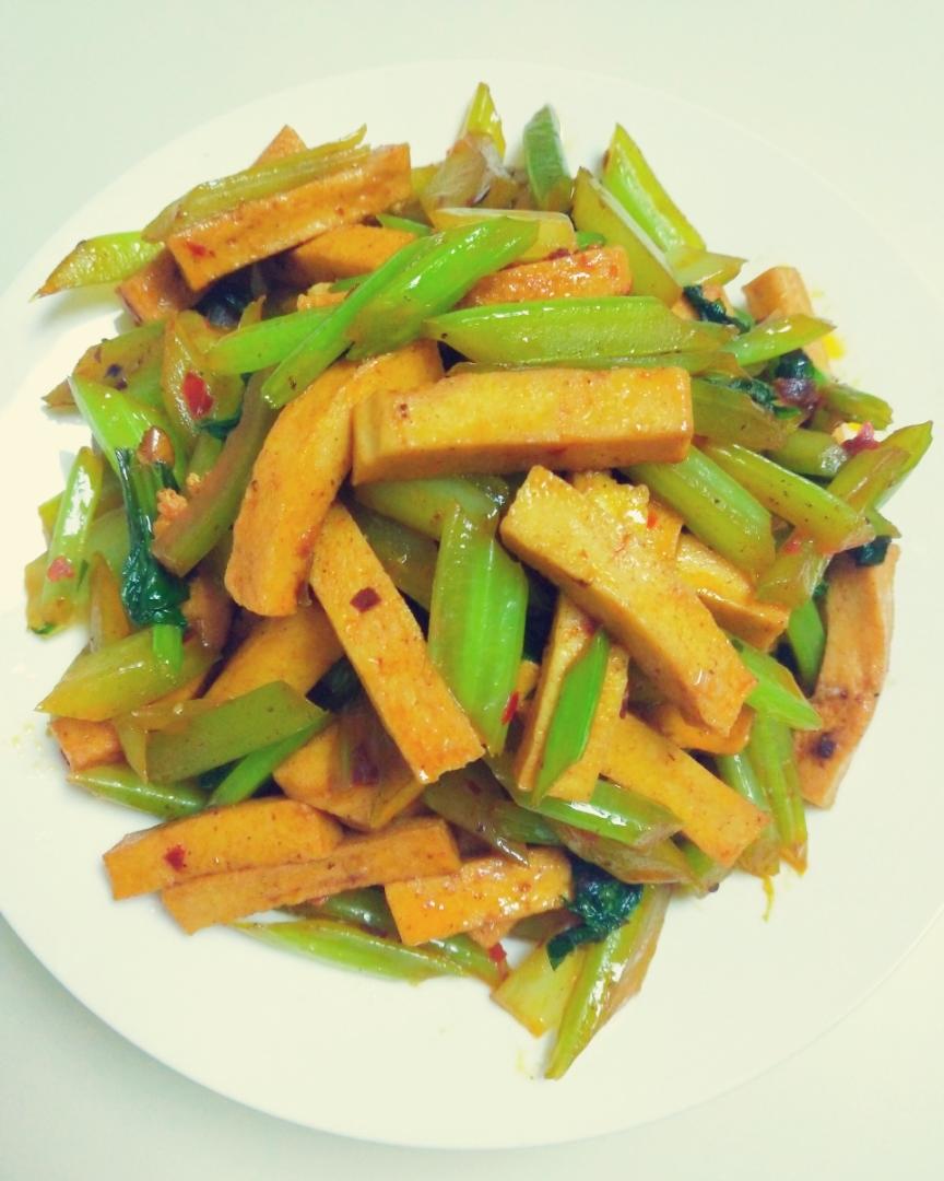 Qianye tofu tossed with celery in doubanjiang red oil