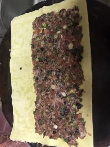 Spread the filling evenly over the sheet - no