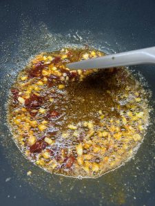 Cook until fragrant and the red oil comes out
