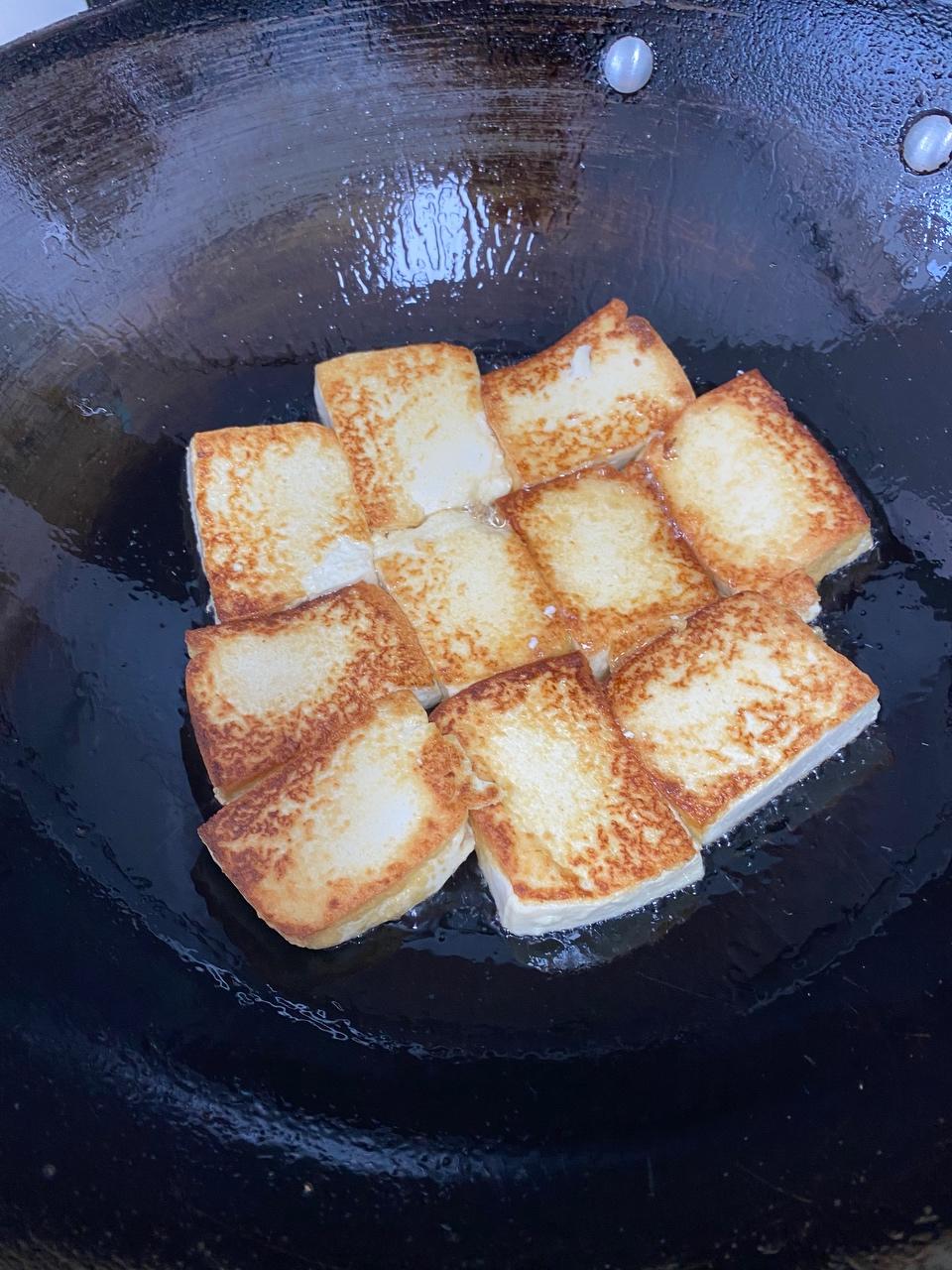 Fry until golden on both sides, then lay it i