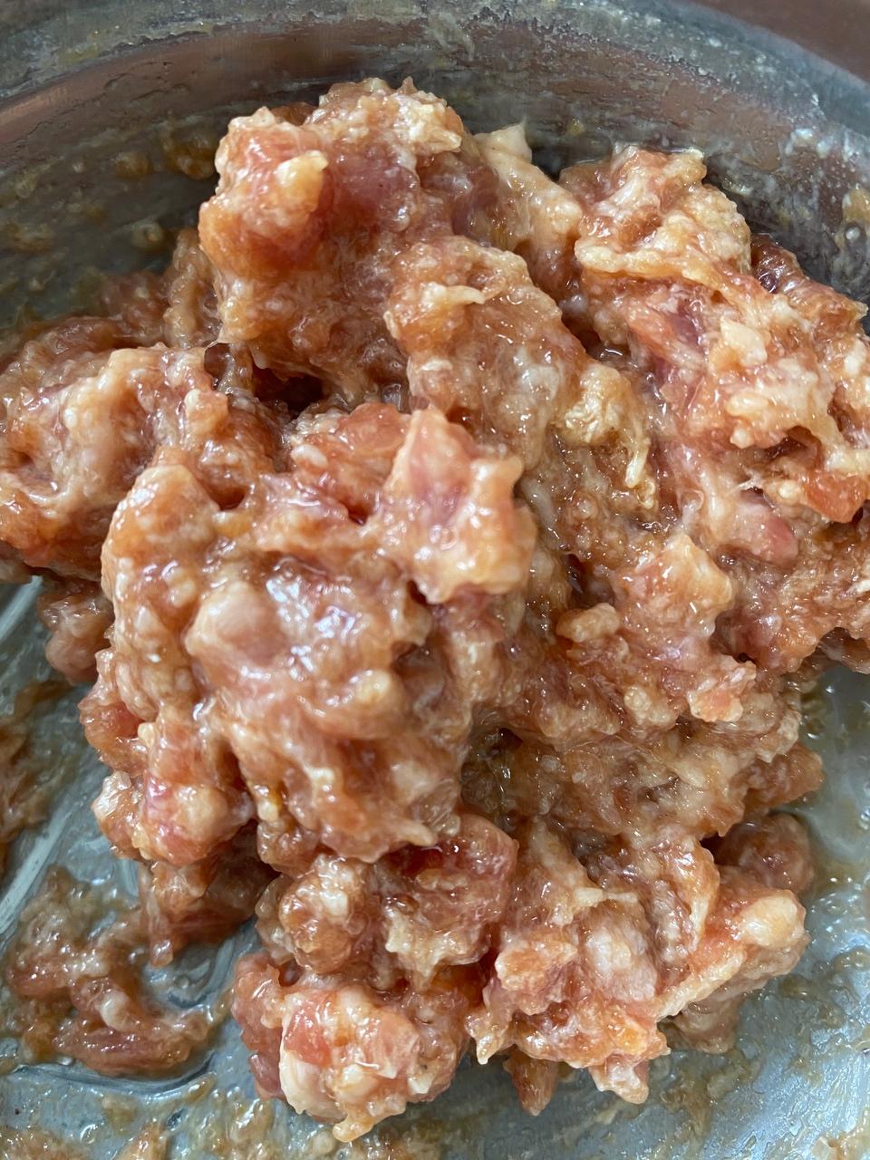 Mince the pork belly and season with salt, pe