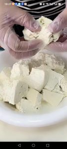 Tear the firm tofu into pieces by hand