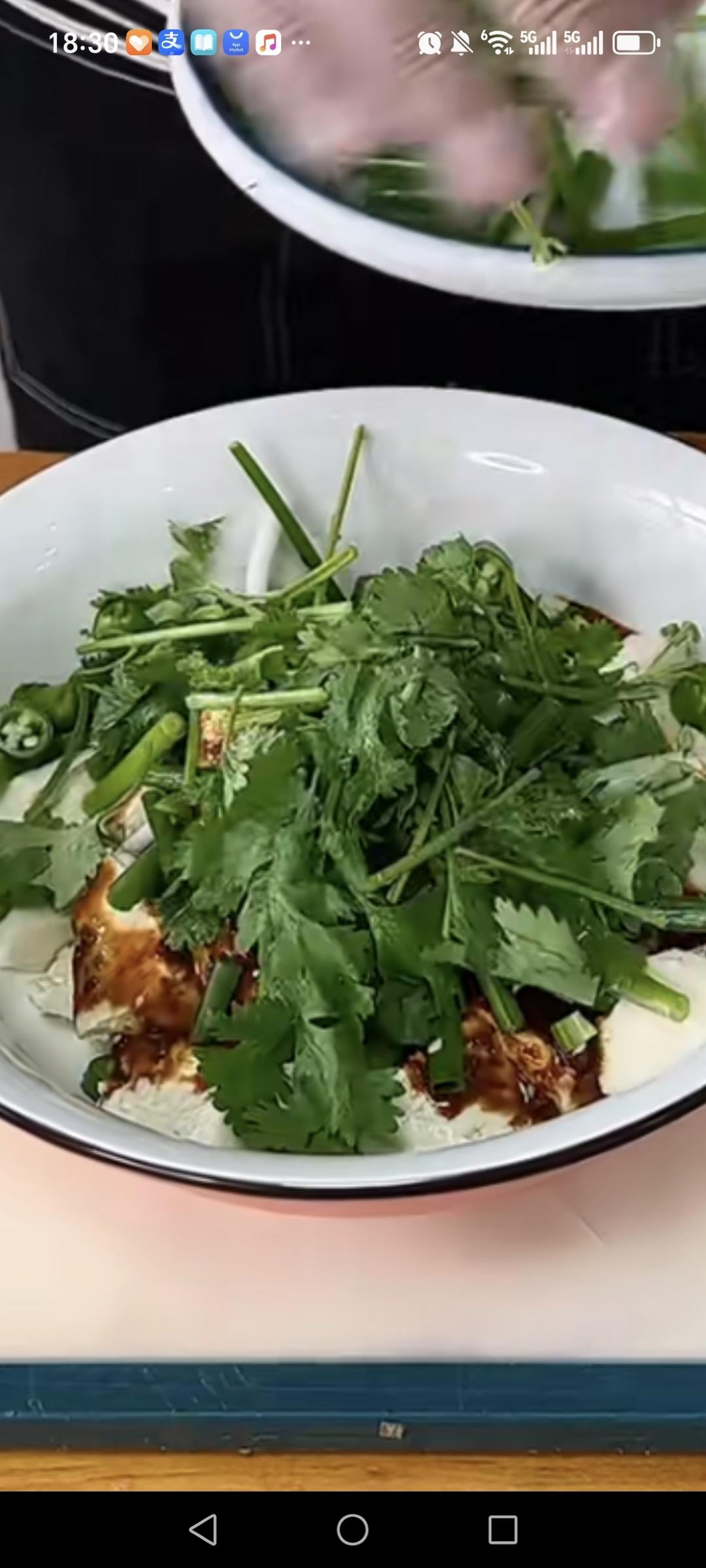 Add the chili rings, scallion, and cilantro