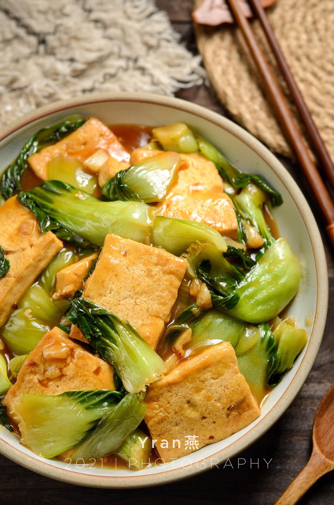 Golden tofu with bright Shanghai greens in a soy glaze