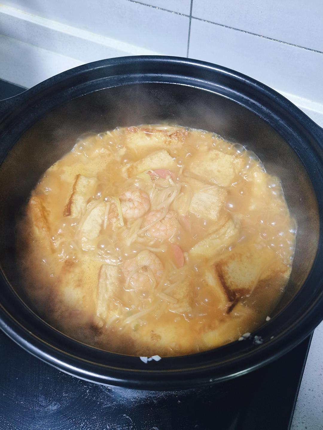 Heat oil and bloom the ginger shreds