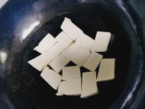 Cut the tofu and pan-fry it