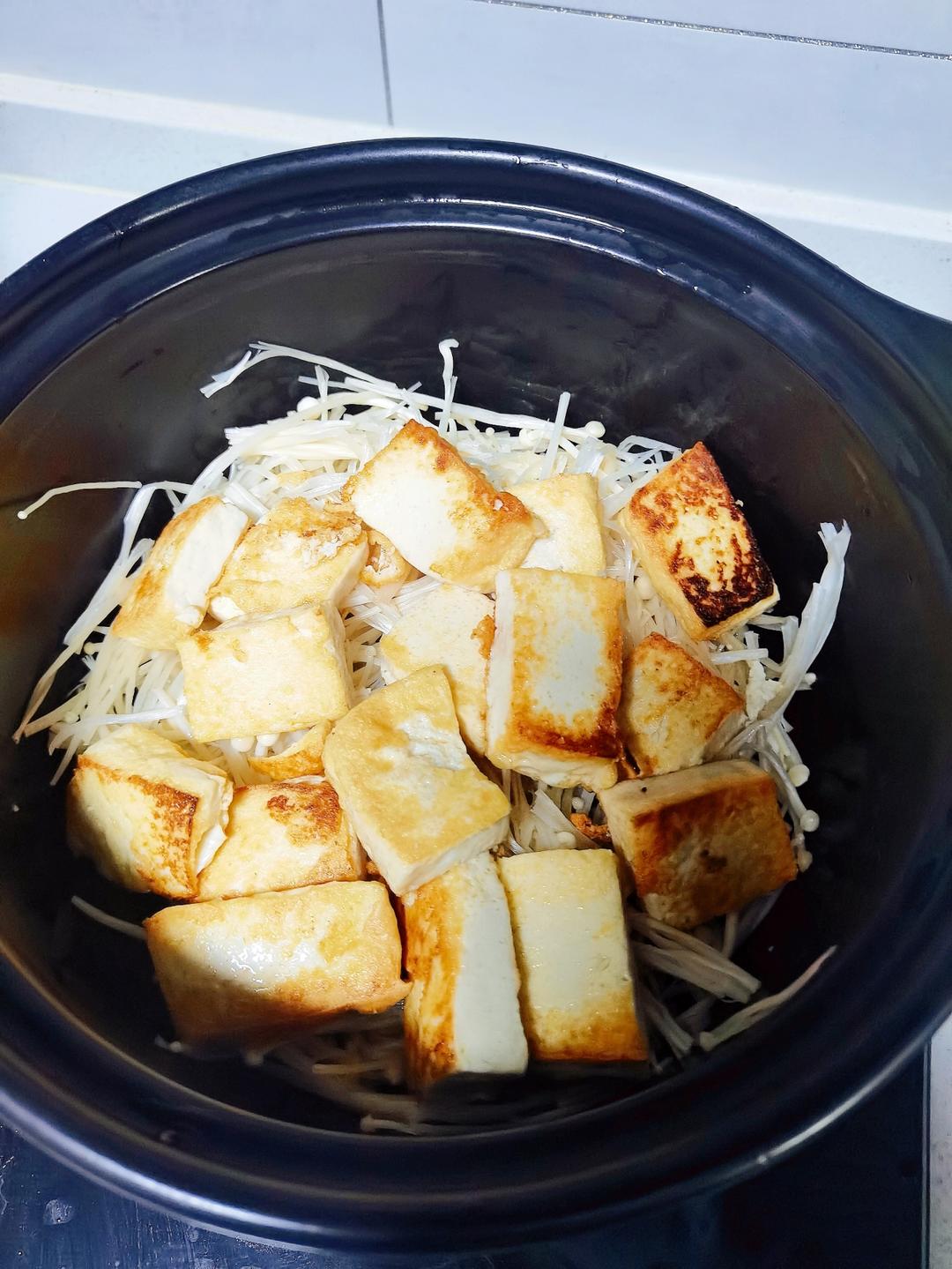 Lay the golden tofu over the enoki