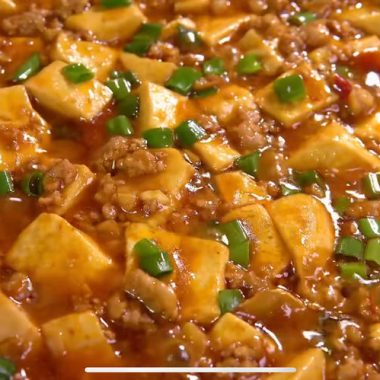 Silken tofu under doubanjiang pork mince in a glossy sauce