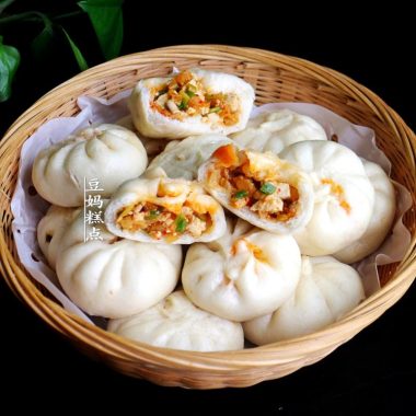 Soft steamed baozi filled with spicy tofu