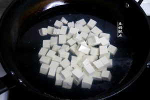 Blanch the tofu cubes