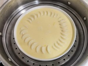 Pour the custard into the plate and set over