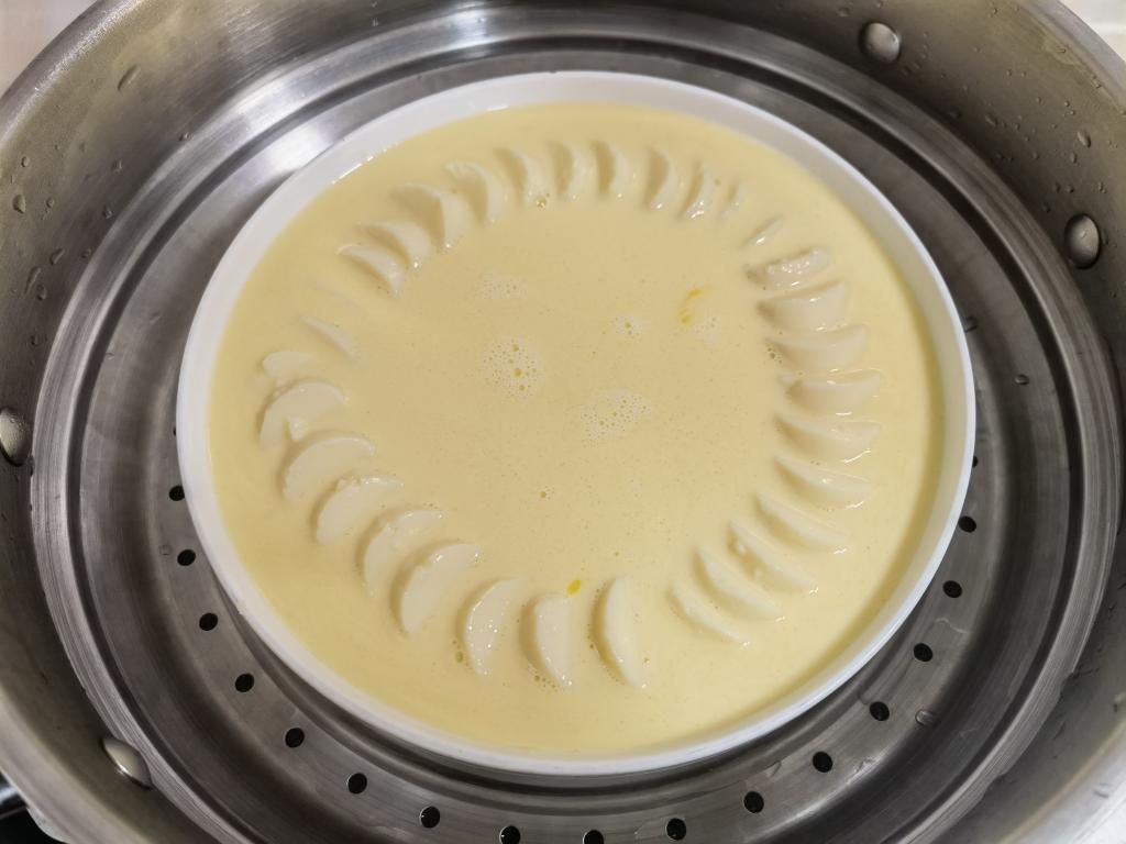 Pour the custard into the plate and set over