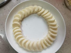 Arrange the rounds in a ring around the plate