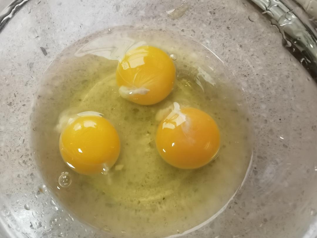 Beat the eggs in a bowl with a little oil