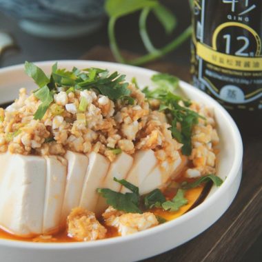 Tofu steamed under a foamy salted-egg topping