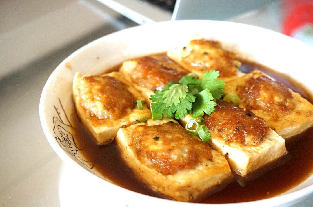Stuffed tofu seared and glazed with pork filling