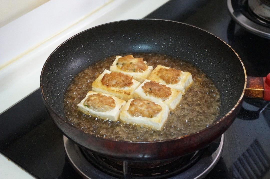 Return the tofu and sauce to the pan