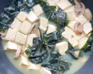 Season and ladle out - the broth is milky whi