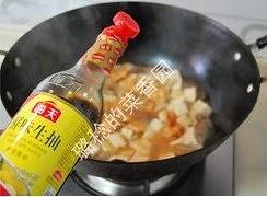 Season with two spoons of abalone sauce - it