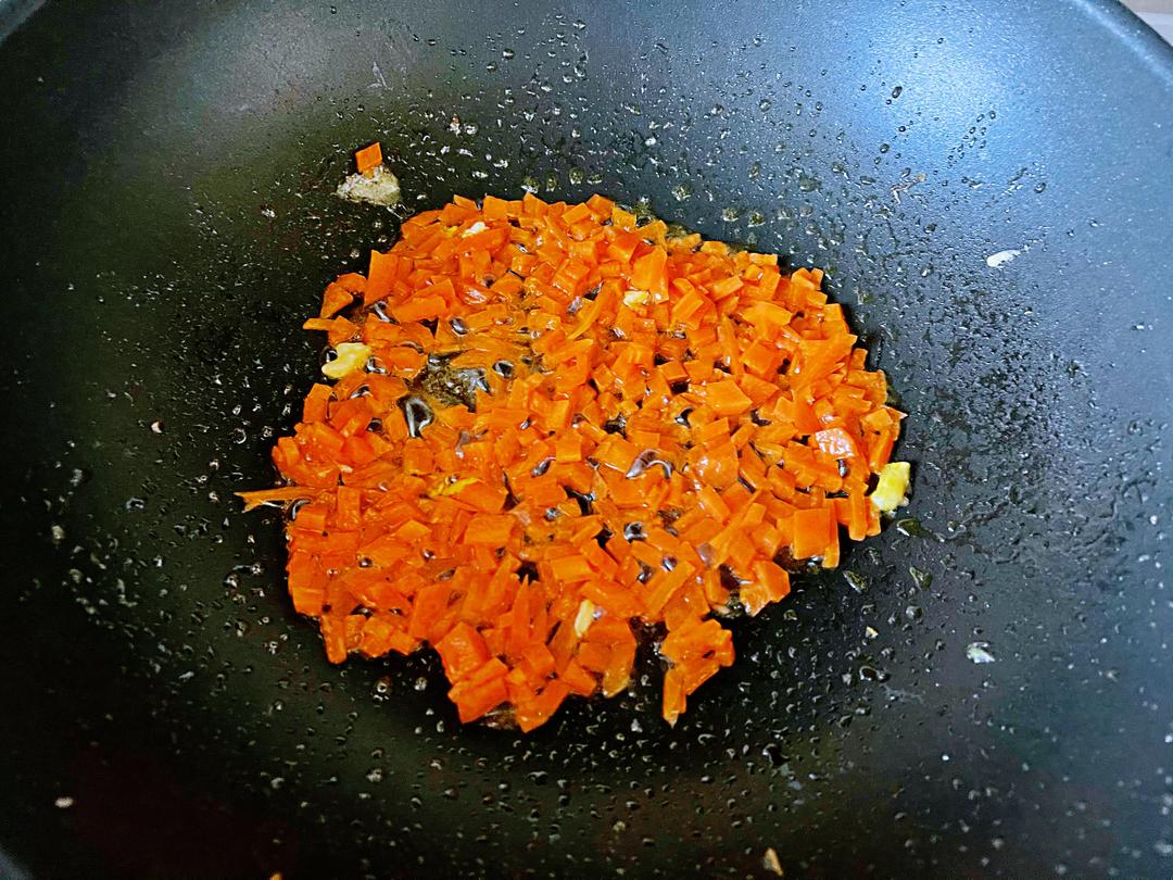 Stir-fry the carrot until it changes color