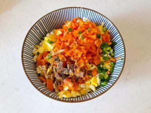 Mix the tofu, egg, carrot, scallion, soy, oys