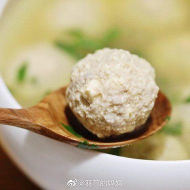 Silky tofu pork meatballs in a clear broth