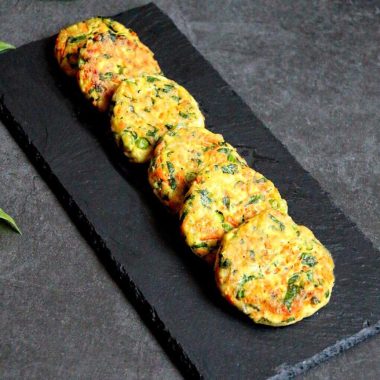 Golden tofu veggie patties on a plate