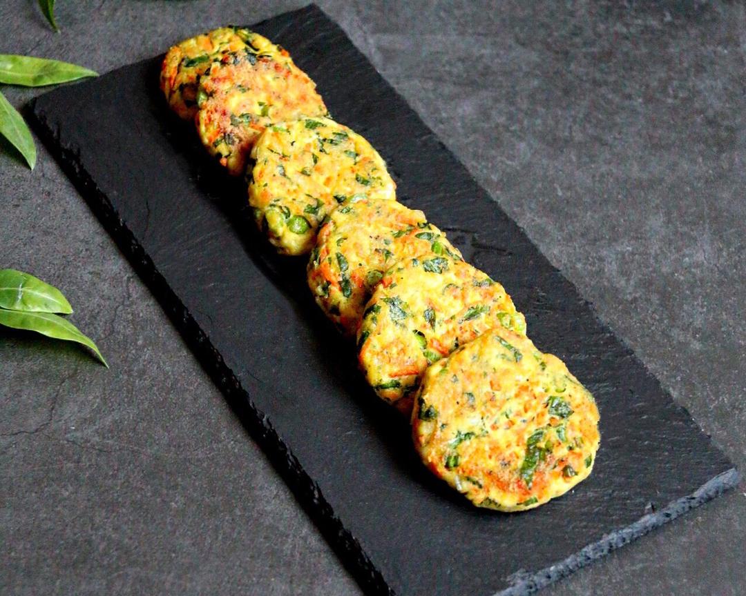 Golden tofu veggie patties on a plate