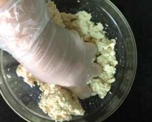 Crumble the tofu by hand