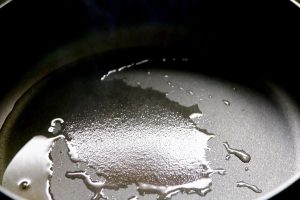 Heat oil in the pan over low heat