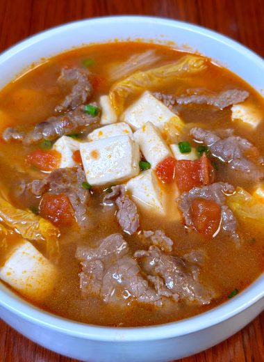 Tender beef and tofu in a sweet-sour tomato broth